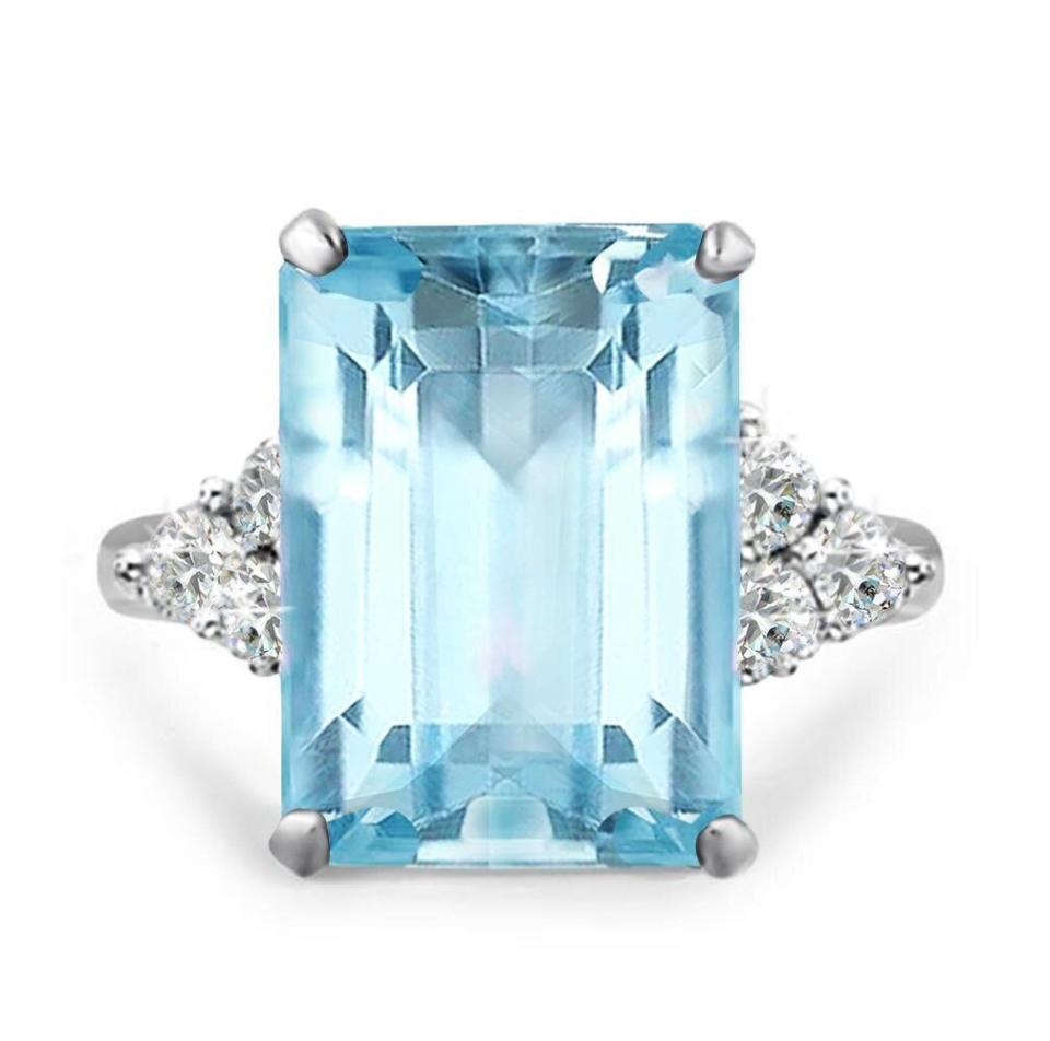 Meghan Markle wore a ring like this one, given to her by Prince Harry, at her <a href="https://www.townandcountrymag.com/society/tradition/a20760121/meghan-markle-princess-diana-aquamarine-ring-royal-wedding-reception/" target="_blank" rel="noopener noreferrer">wedding reception</a>.<strong> </strong><a href="https://fave.co/38kkJai" target="_blank" rel="noopener noreferrer"><strong>Get it now for $30 at Walmart</strong></a>.