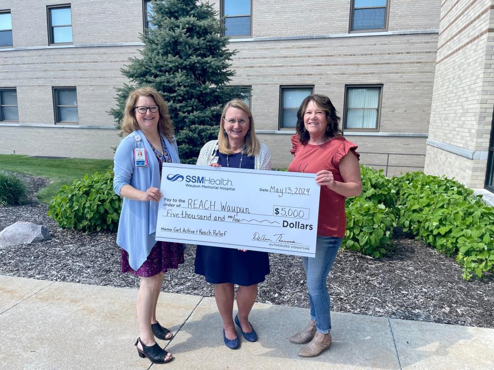 Jayne Harmsen, right, REACH Waupun executive director, accepts a $5,000 donation from Nicole Gill, left, vice president, clinical administrator, and DeAnn Thurmer, president, SSM Health Waupun Memorial Hospital/SSM Health Ripon Community Hospital, for its Get Active! program. The program provides financial assistance to students within the Waupun Area School District or Central Wisconsin Christian School to pay for fees related to sports, clubs, or extracurricular activities. For more information, contact REACH Waupun at 920-325-2011 or info@reachwaupun.org.