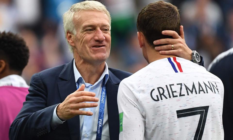 Didier Deschamps congratulates Antoine Griezmann, scorer of France’s second goal, at the final whistle.