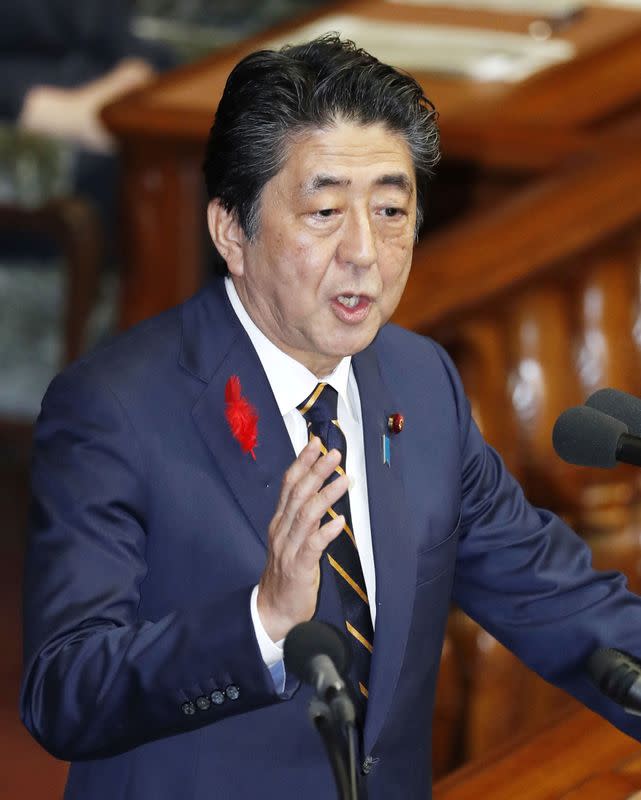 Japanese Prime Minister Shinzo Abe delivers a speech at a parliamentary session in Tokyo