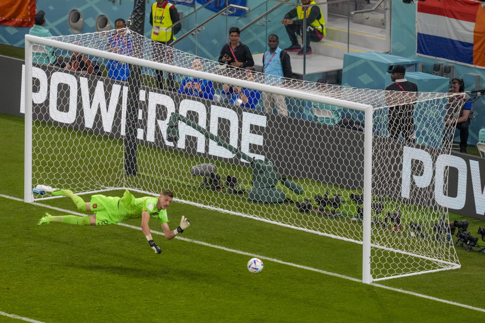 goalkeeper Andries Noppert of the Netherlands saves the ball during the World Cup, group A soccer match between Senegal and Netherlands at the Al Thumama Stadium in Doha, Qatar, Monday, Nov. 21, 2022. (AP Photo/Thanassis Stavrakis)