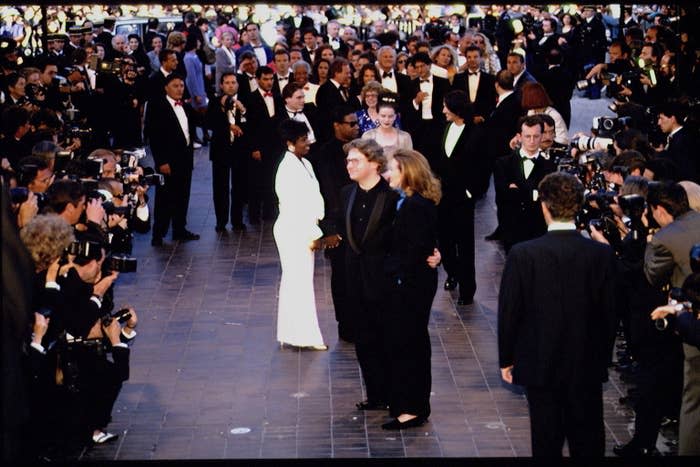 An overhead shot of Kate entering the event surrounded by photographers