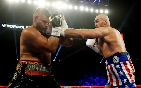 Tyson Fury breaks through Tom Schwarz's guard - Credit: reuters