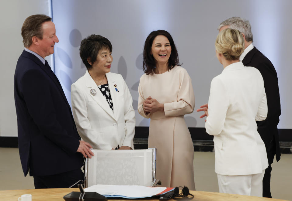 From left, British Foreign Secretary David Cameron, Japanese Foreign Minister Yoko Kamikawa, German Foreign Minister Annalena Baerbock, Canadian Minister of Foreign Affairs Melanie Joly and Italian Foreign Minister Antonio Tajani speak during a meeting on the second day of a G7 foreign ministers meeting on Capri island, Italy, Thursday April 18, 2024. (Remo Casilli/Pool via AP)