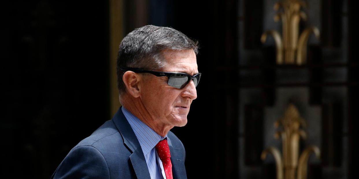 FILE - In this Monday, June 24, 2019, file photo, Michael Flynn, President Donald Trump's former national security adviser, departs a federal courthouse after a hearing, in Washington. Trump said Sunday, March 15, 2020, that he is considering a full pardon for Flynn, who had pleaded guilty to lying to the FBI about dealings with Russia’s ambassador before Trump took office. (AP Photo/Patrick Semansky, File)