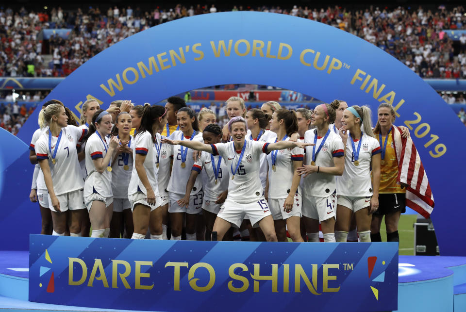 United States' Megan Rapinoe celebrates with teammates after winning the Women's World Cup final soccer match between US and The Netherlands at the Stade de Lyon in Decines, outside Lyon, France, Sunday, July 7, 2019. (AP Photo/Alessandra Tarantino)