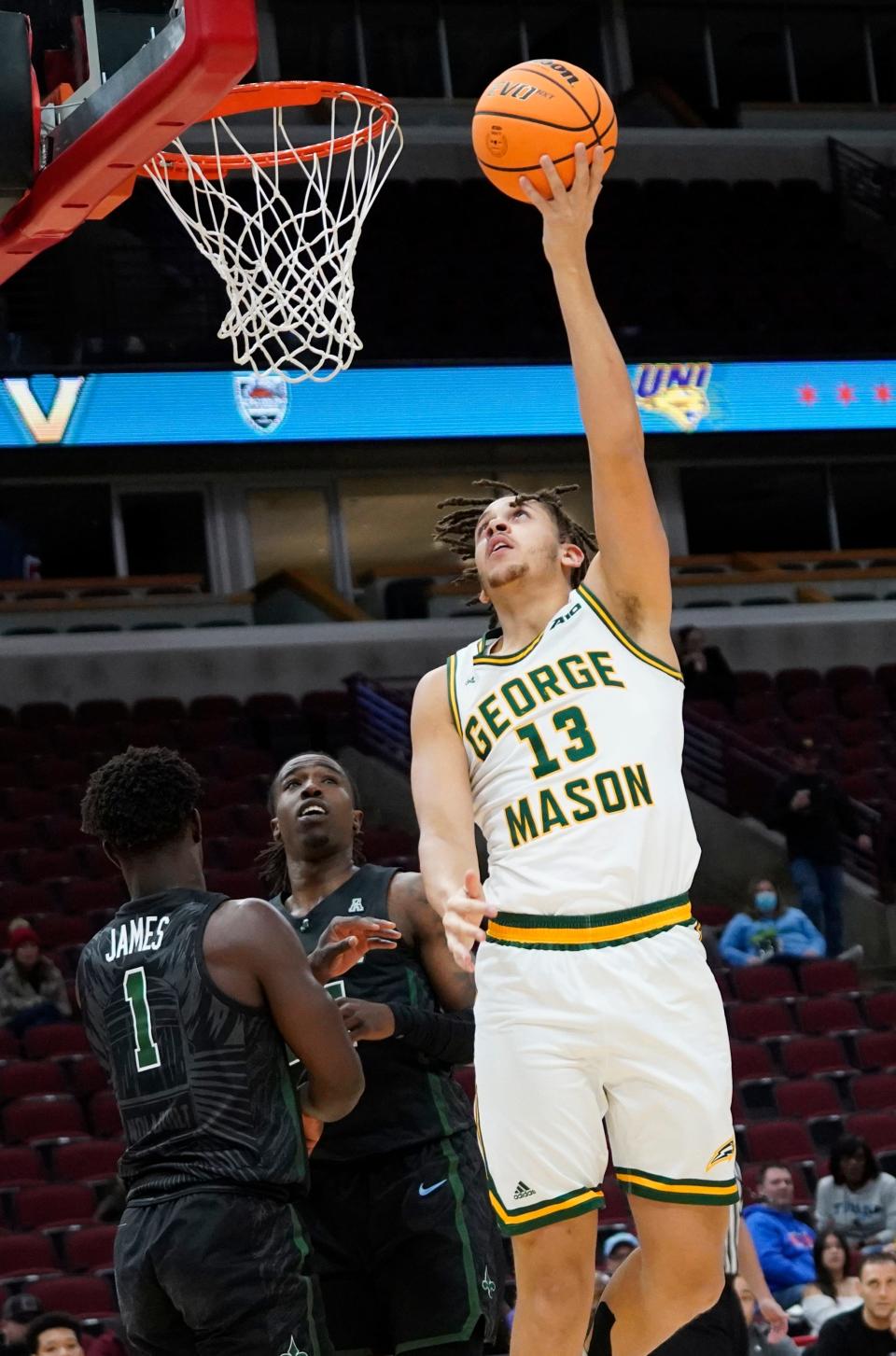 George Mason forward Josh Oduro goes up for a shot during a game against Tulane in December in Chicago.