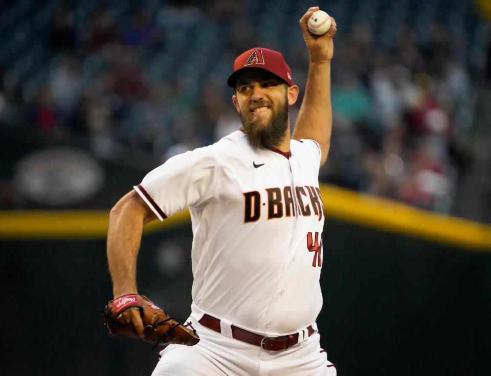 Apr 12, 2022; Phoenix, Ariz., U.S.;  Arizona Diamondbacks starting pitcher Madison Bumgarner (40) throws against the Houston Astros during the first inning at Chase Field.