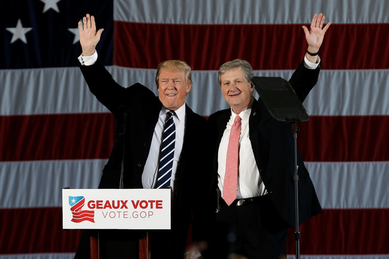 Sen. John Kennedy of Louisiana (right), pictured with President Donald Trump, says he's planning to introduce a bill to prohibit airlines from putting animals in overhead bins. He also has said America doesn't need new gun laws. (Photo: Mike Segar / Reuters)