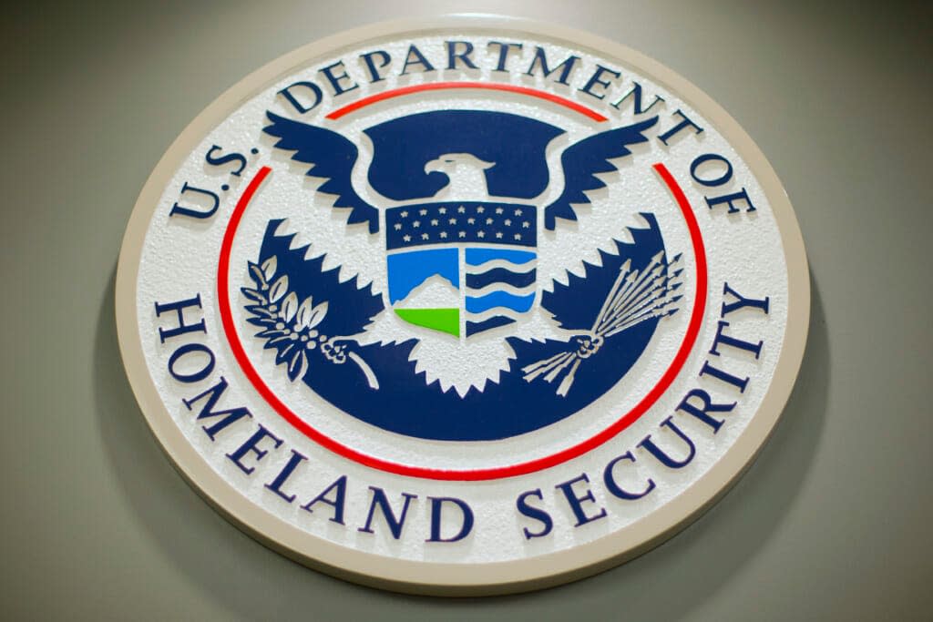FILE – The Department of Homeland Security logo is seen during a news conference in Washington, Feb. 25, 2015. DHS says a looming Supreme Court decision on abortion, an increase of migrants at the U.S.-Mexico border and the midterm elections are potential triggers for extremist violence over the next six months. DHS said June 7, 2022, in the National Terrorism Advisory System bulletin the U.S. was in a “heightened threat environment” already and these factors may worsen the situation. (AP Photo/Pablo Martinez Monsivais, File)