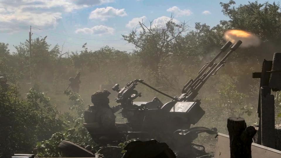 FILE - In this photo released by the Russian Defense Ministry Press Service on Sunday, June 2, 2024, a Russian soldier operates a gun at an undisclosed location in Ukraine. Moscow’s troops are forging through Ukraine's defenses along the front line of the battlefield in a relentless onslaught this summer, prompting the West to push for new weapons and strategies to shore up Kyiv. (Russian Defense Ministry Press Service via AP, File)