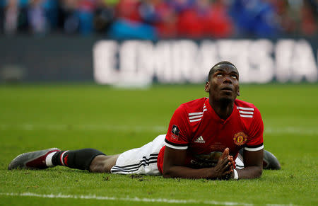 Soccer Football - FA Cup Final - Chelsea vs Manchester United - Wembley Stadium, London, Britain - May 19, 2018 Manchester United's Paul Pogba reacts after heading a chance wide REUTERS/Andrew Yates