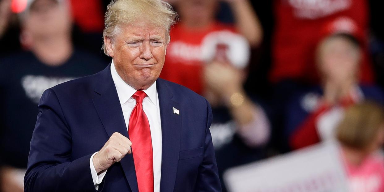 President Donald Trump gestures as he arrives at a campaign rally in Hershey, Pa., Tuesday, Dec. 10, 2019. (AP Photo/Matt Rourke)