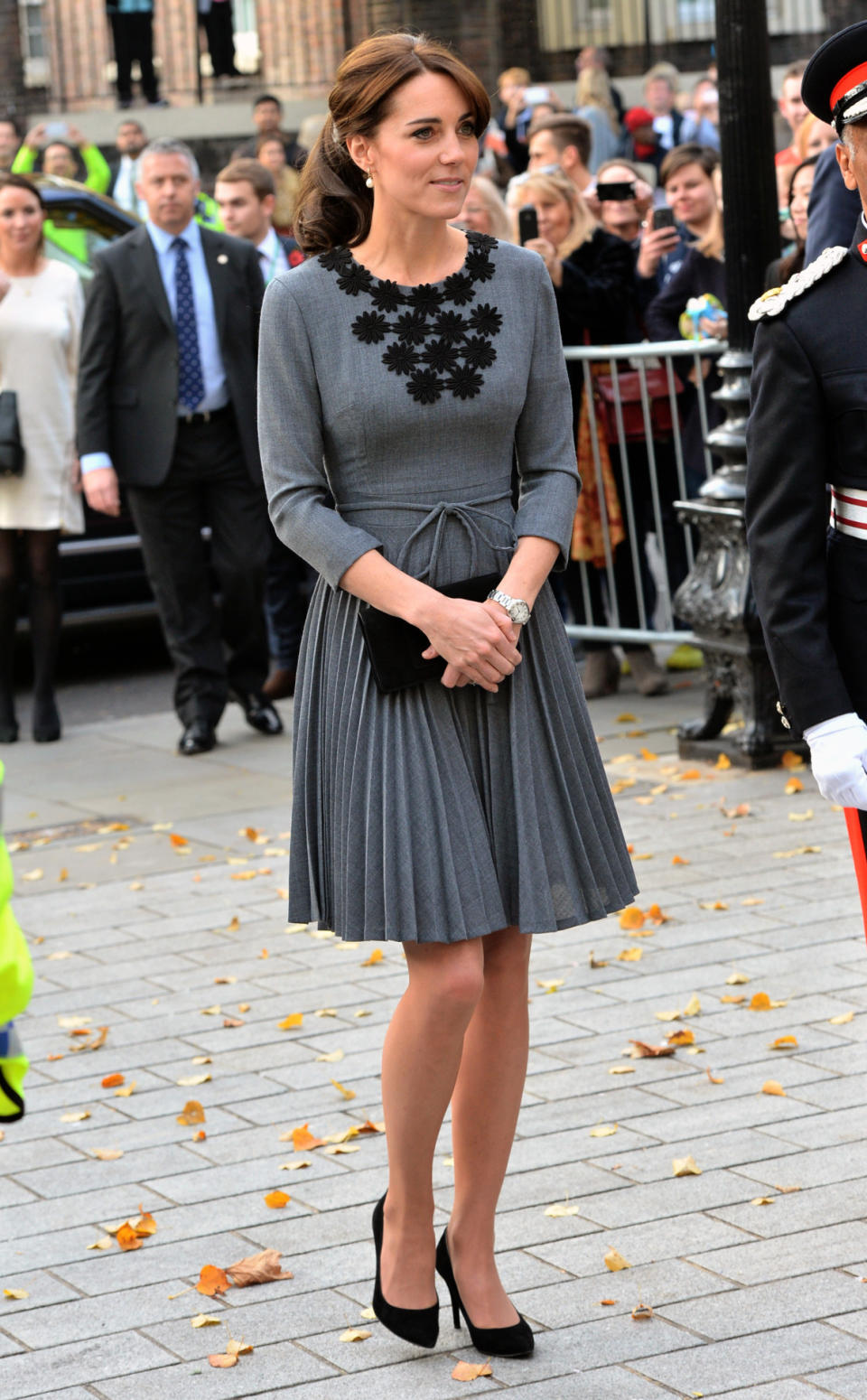 <p>For an engagement at a children’s mentoring programme, Kate wore a grey Orla Kiely dress from the designer’s AW11 collection. Stuart Weitzman pumps and a black suede Mulberry clutch completed her look. </p><p><i>[Photo: PA]</i></p>