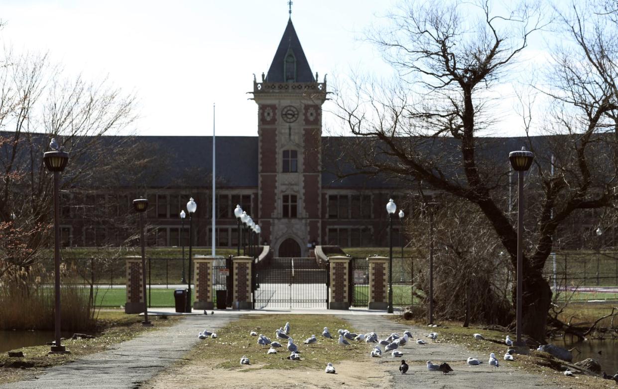 <span class="caption">The front gate of New Rochelle High School in New Rochelle, N.Y. The school was closed March 11, 2020 as part of efforts to contain spread of coronavirus.</span> <span class="attribution"><a class="link " href="http://www.apimages.com/metadata/Index/Virus-Outbreak-Containment-Area/32b5d4410f1c432baae285487eafd5c9/2/0" rel="nofollow noopener" target="_blank" data-ylk="slk:AP Photo/Chris Erhmann;elm:context_link;itc:0;sec:content-canvas">AP Photo/Chris Erhmann</a></span>