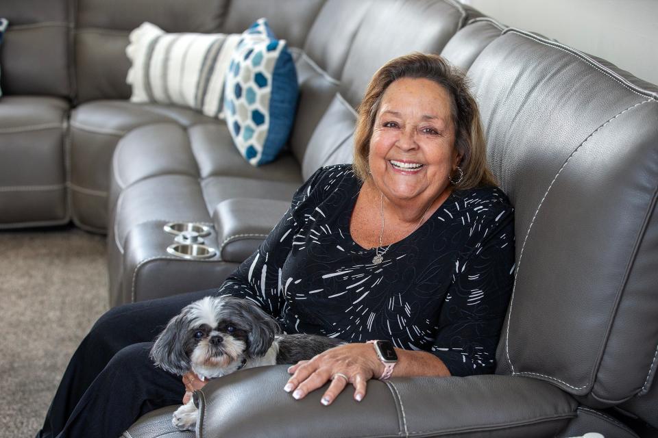 Michele Corcione of Toms River, who received a lung transplant in 2023, sits with her dog, Luna, at her home in Toms River, NJ Thursday, April 24, 2024.