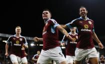 Britain Football Soccer - Burnley v Watford - Premier League - Turf Moor - 26/9/16 Burnley's Michael Keane celebrates scoring their second goal with George Boyd and teammates Action Images via Reuters / Jason Cairnduff