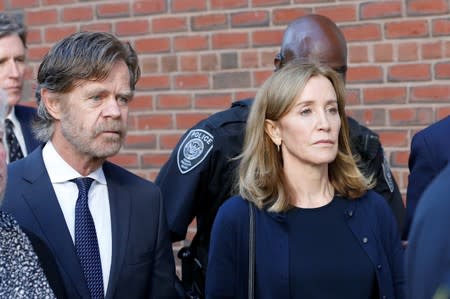 Actress Felicity Huffman and husband William H. Macy leave the federal courthouse in Boston