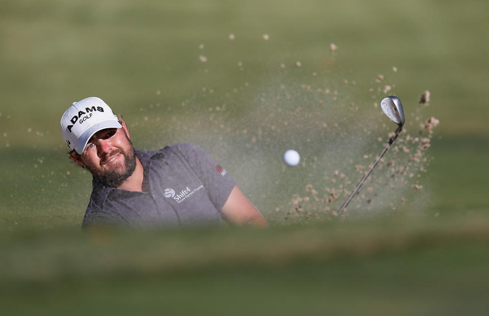 ATLANTA, GA - SEPTEMBER 23: Ryan Moore hits a bunker shot on the 16th hole during the final round of the TOUR Championship by Coca-Cola at East Lake Golf Club on September 23, 2012 in Atlanta, Georgia. (Photo by Kevin C. Cox/Getty Images)