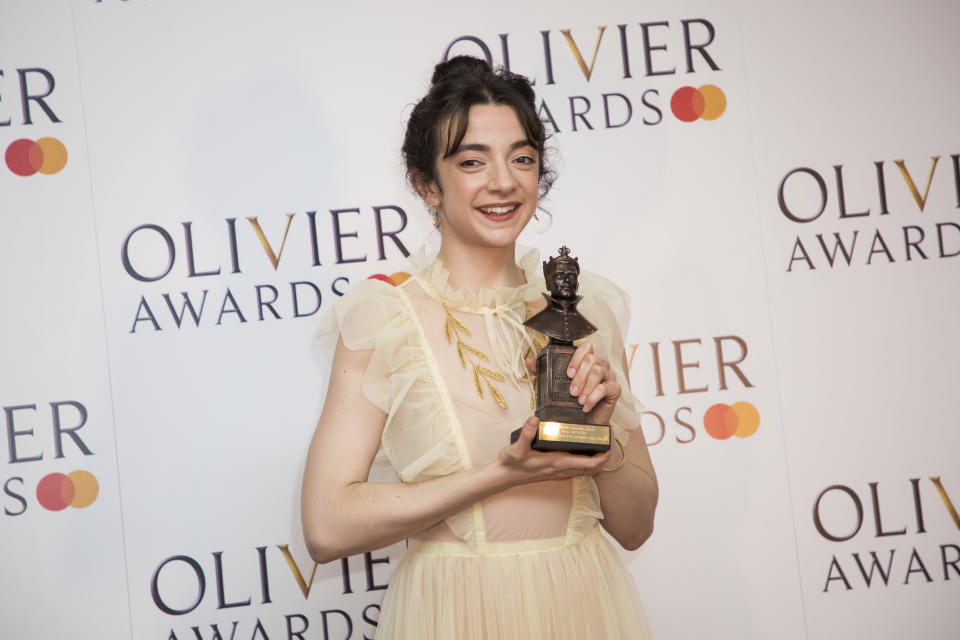 Actress Patsy Ferran poses for photographers backstage with her Best Actress award for her role in the play 'Summer and Smoke' at the Olivier Awards in London, Sunday, April 7, 2019. (Photo by Vianney Le Caer/Invision/AP)