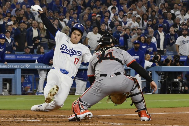 Los Angeles Dodgers designated hitter Shohei Ohtani (L) now owns the record for the most MLB home runs hit by a Japanese-born player. File Photo by Jim Ruymen/UPI
