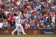 St. Louis Cardinals' Albert Pujols watches his two-run home run during the eighth inning of a baseball game against the Chicago Cubs Sunday, Sept. 4, 2022, in St. Louis. (AP Photo/Jeff Roberson)