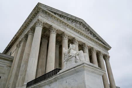 FILE PHOTO: The U.S. Supreme Court is seen after the court revived Ohio's contentious policy of purging infrequent voters from its registration rolls, overturning a lower court ruling that Ohio's policy violated the National Voter Registration Act, in Washington, U.S., June 11, 2018. REUTERS/Erin Schaff/File Photo