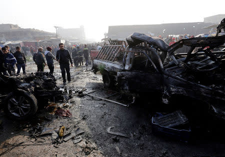 Wreckage is seen at the site of a car bomb attack at a vegetable market in eastern Baghdad, Iraq January 8, 2017. REUTERS/Wissm al-Okili