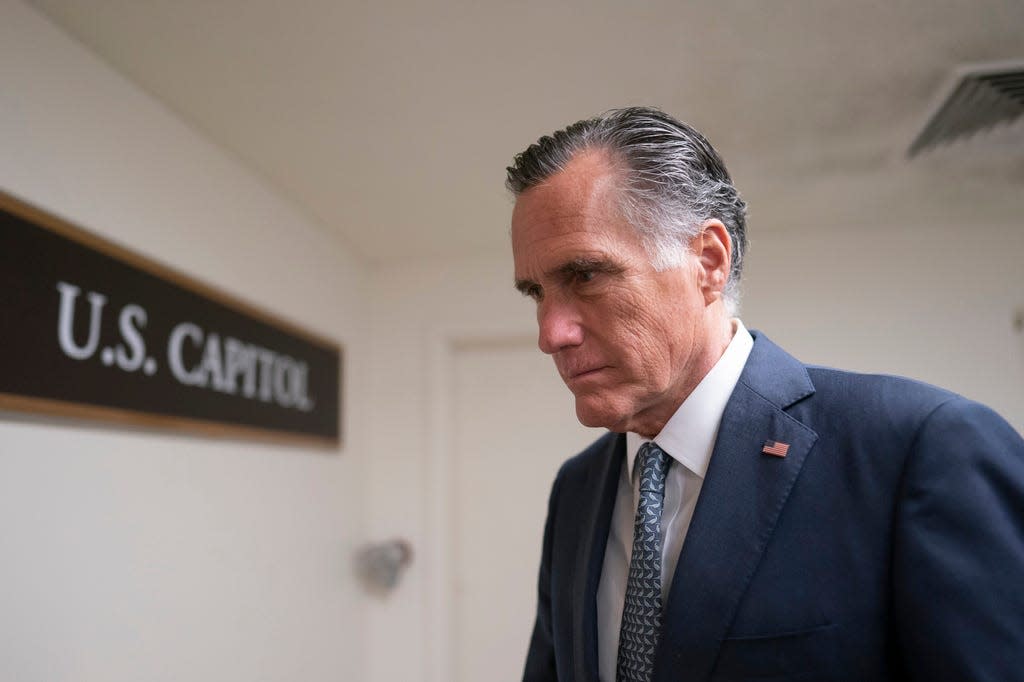 FILE - Sen. Mitt Romney, R-Utah, a member of the Senate Foreign Relations Committee, heads to a vote before a national security briefing on Ukraine, at the Capitol in Washington, on March 16, 2022. (AP Photo/J. Scott Applewhite, File)