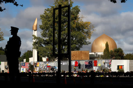 A police officer stands guard outside Al Noor mosque in Christchurch, New Zealand, March 22, 2019. REUTERS/Jorge Silva