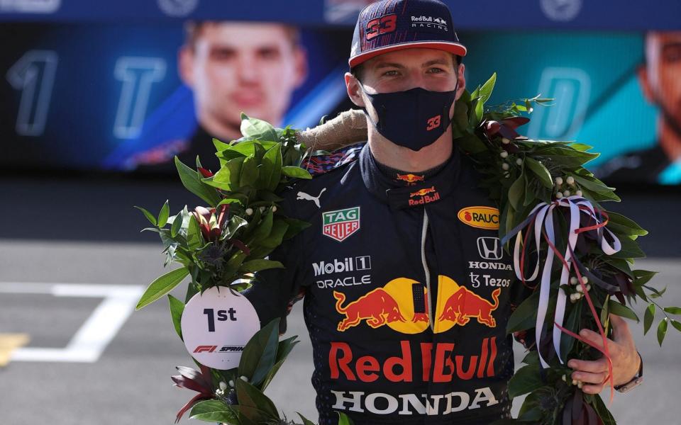 Max Verstappen with his laurel wreath at Silverstone having won the sprint race there - AFP