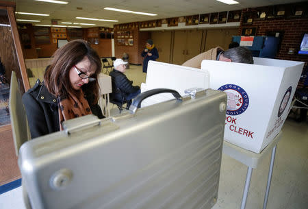 Illinois' 3rd Congressional District candidate for Congress, Marie Newman, votes in the Democratic Party's congressional primary election at the Lyons Township in La Grange, Illinois, U.S. March 20, 2018. REUTERS/Kamil Krzaczynski