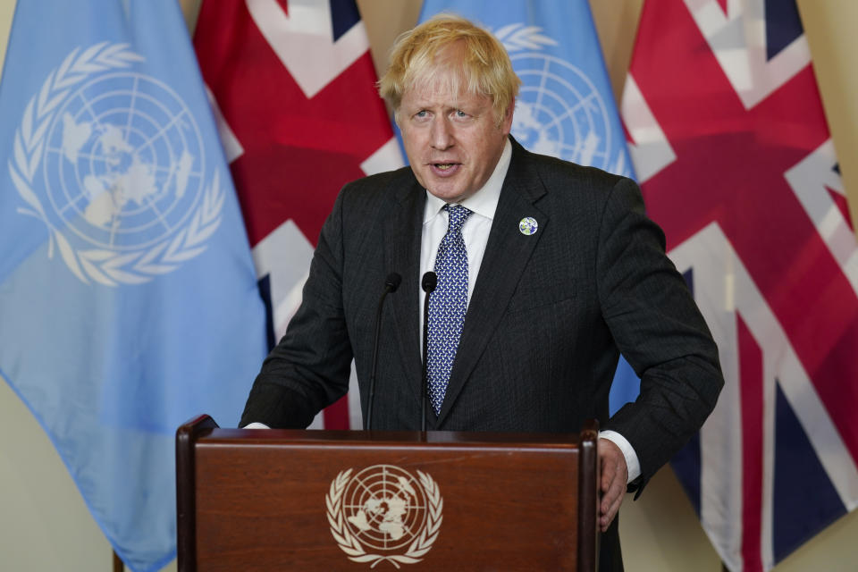 British Prime Minister Boris Johnson speaks to reporters after meeting with Antonio Guterres, Secretary General of the United Nations, at United Nations headquarters, Monday, Sept. 20, 2021, during the 76th Session of the U.N. General Assembly in New York. (AP Photo/John Minchillo, Pool)