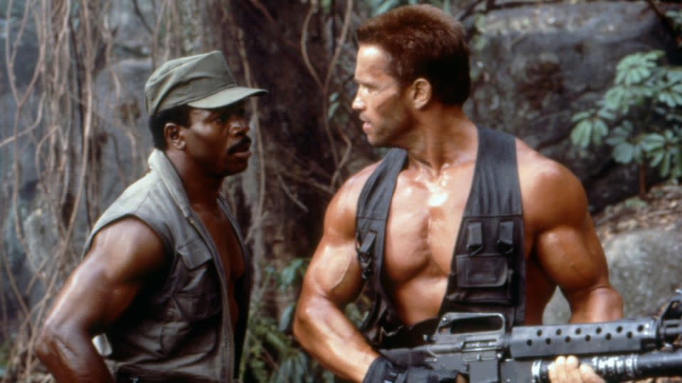 Carl Weathers and Arnold Schwarzenegger on the set of "Predator" (1987). - Sunset Boulevard/Corbis Historical/Getty Images
