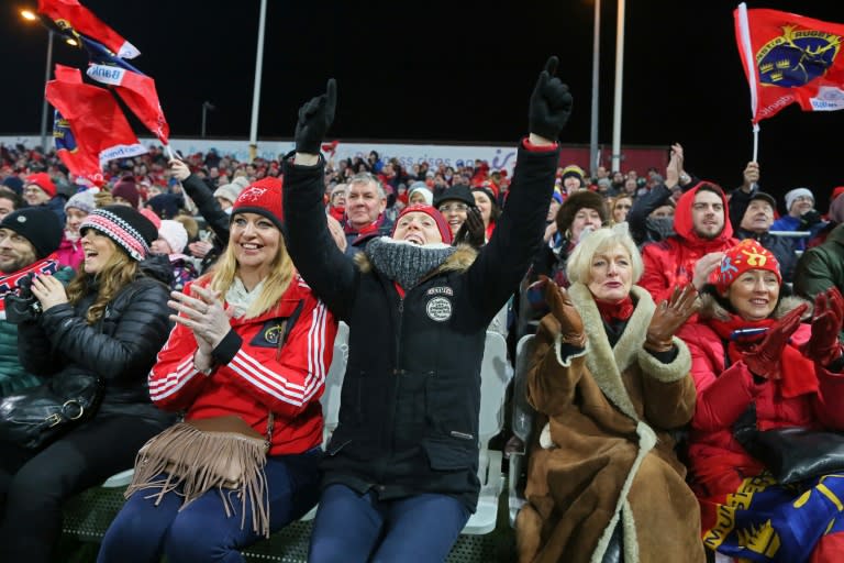 Munster supporters celebrate their first try during the European Rugby Champions Cup pool 1 match against Racing 92, at Thomond Park in Limerick, Ireland, in January 2017