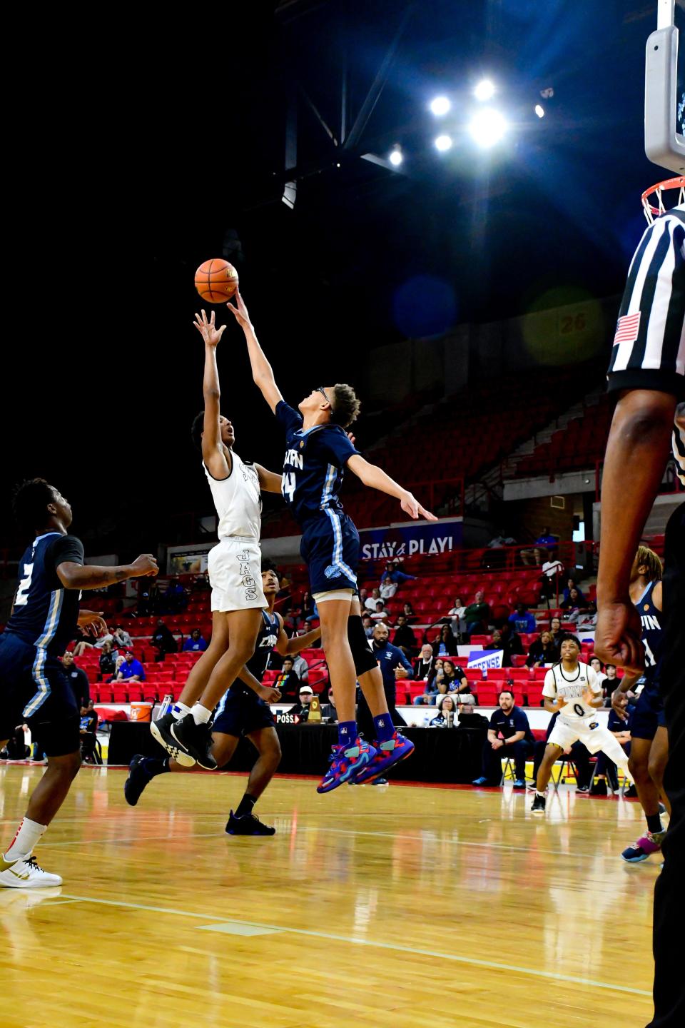 Chapin's Jayden Leverett blocks a shot against Mansfield Summit on Saturday in the Region 1-5A boys basketball title game in Wichita Falls. Mansfield Summit won, 54-47, to advance to the state tourney.