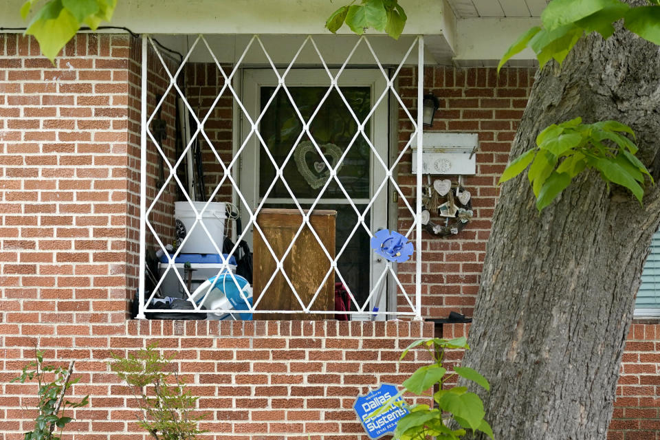 The front entrance of a home connected to suspected mall gunman, Mauricio Garcia, is seen, Sunday, May 7, 2023, in Dallas. The home was searched overnight by law enforcement officials related to the mall shooting in Allen, Texas. (AP Photo/Tony Gutierrez)