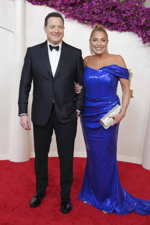 Brendan Fraser, left, and Jeanne Moore arrive at the Oscars on Sunday, March 10, 2024, at the Dolby Theatre in Los Angeles. (Photo by Jordan Strauss/Invision/AP)