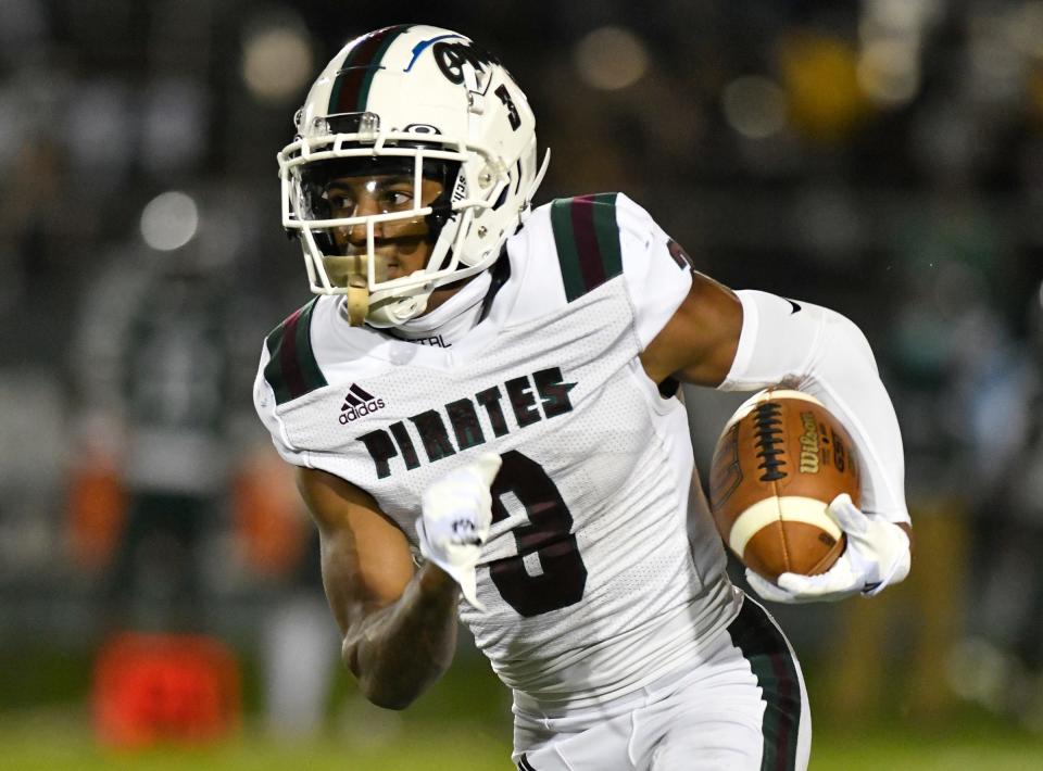Cedar Creek's JoJo Bermudez (3) runs for a gain during Friday nights game against Winslow Township. The Pirates defeated Winslow in Atco, 35-27. Oct. 15, 2021.