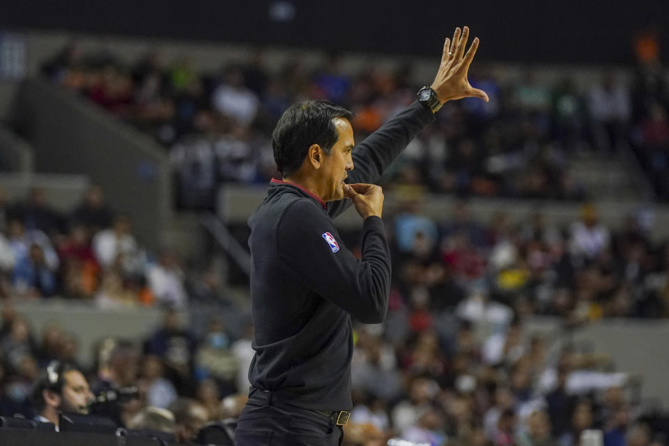 Miami Heat's head coach Erik Spoelstra gestures during the second half of an NBA basketball game against San Antonio Spurs, at the Mexico Arena in Mexico City, Saturday, Dec. 17, 2022. (AP Photo/Fernando Llano)