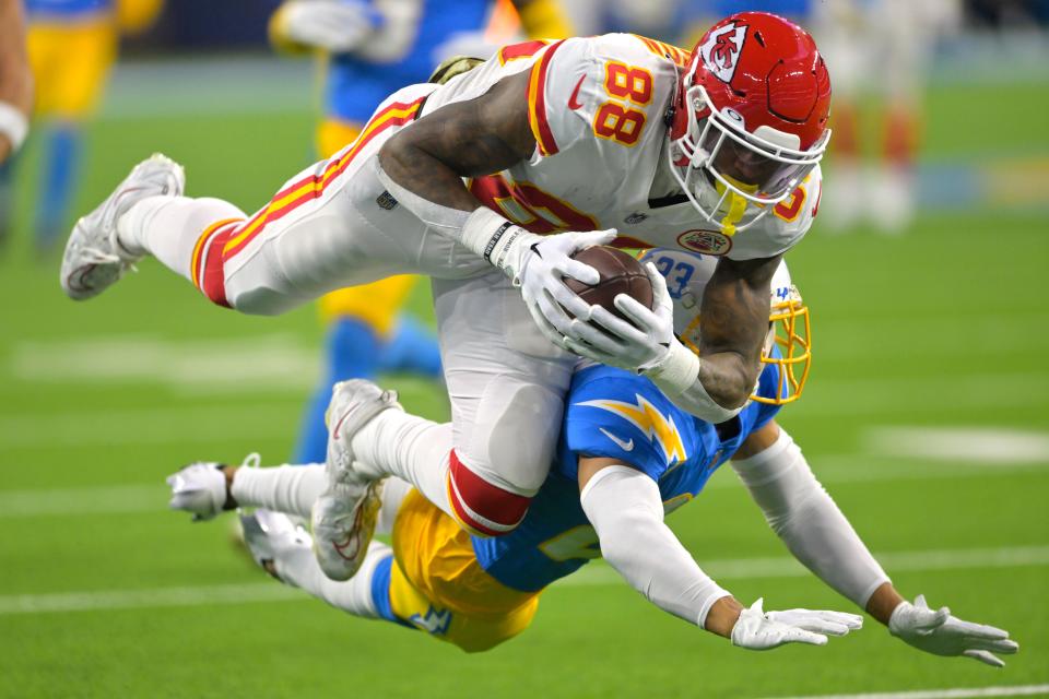 Kansas City Chiefs tight end Jody Fortson, top, makes a catch as Los Angeles Chargers cornerback Bryce Callahan defends during the first half of an NFL football game Sunday, Nov. 20, 2022, in Inglewood, Calif. (AP Photo/Jayne Kamin-Oncea)