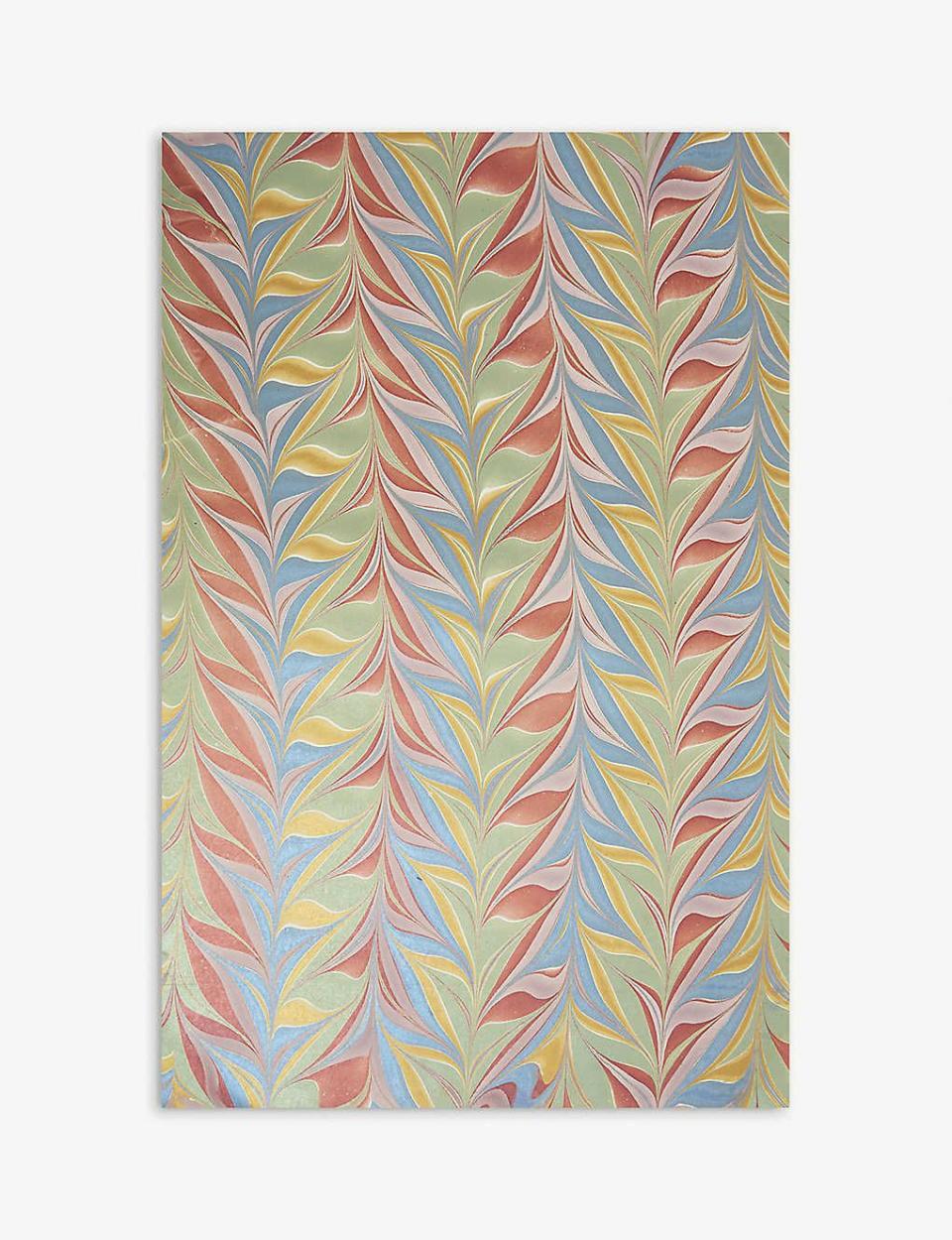 <p>Paper Mirchi, the forward-thinking brand behind this marbled and feathered wrapping paper, works with small artisan producers in India to create its distinctive designs. This pattern’s slightly metallic finish makes it extra festive. £5 for 15 sheets, <a href="https://www.selfridges.com/GB/en/cat/christmas-marbled-gift-wrap-76cm-x-50cm_R03788219/?previewAttribute=MULTI-COLOURED" rel="nofollow noopener" target="_blank" data-ylk="slk:selfridges.com;elm:context_link;itc:0;sec:content-canvas" class="link ">selfridges.com</a></p>