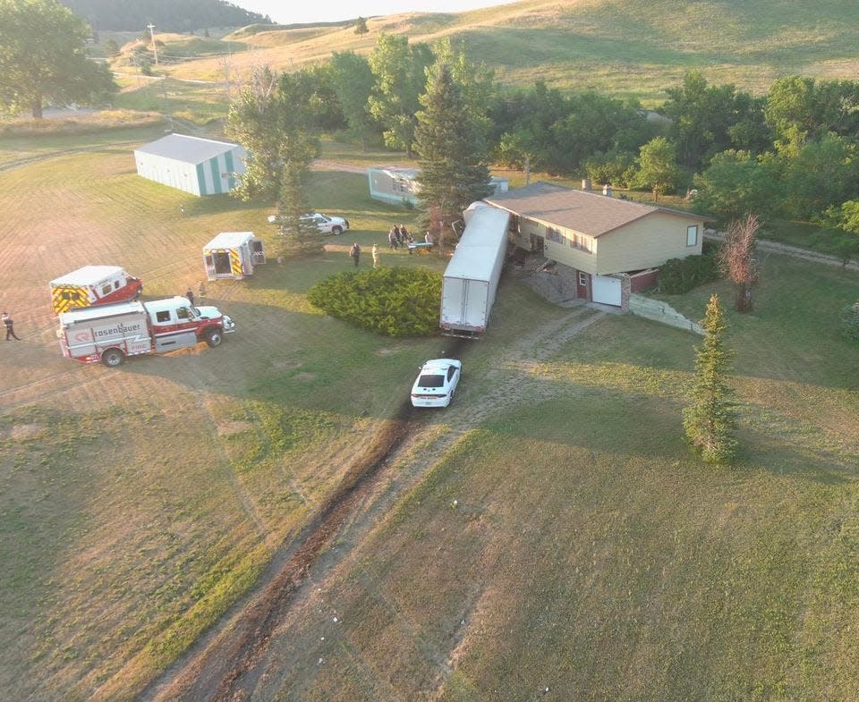 A semitruck crashed into a house on Interstate 90 near mile marker 32 near Sturgis on Wednesday morning.