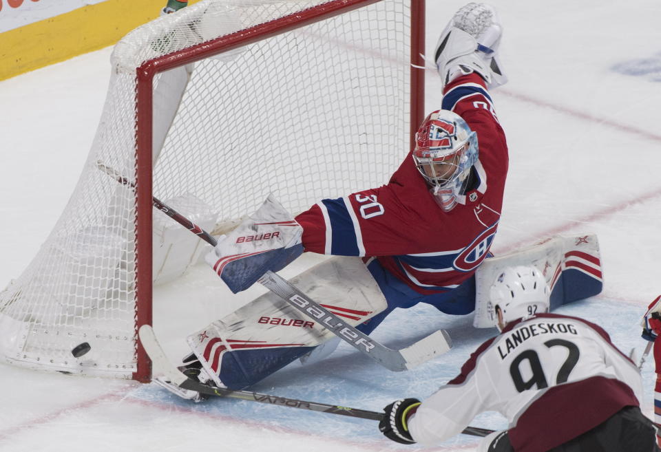 Montreal Canadiens goaltender Cayden Primeau makes a save against Colorado Avalanche's Gabriel Landeskog during the second period of an NHL hockey game Thursday, Dec. 5, 2019, in Montreal. (Graham Hughes/The Canadian Press via AP)