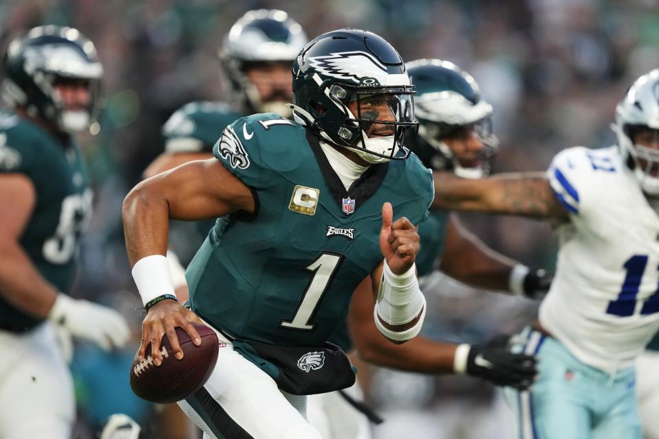 Philadelphia Eagles quarterback Jalen Hurts (1) runs with the ball during the first half of an NFL football game against the Dallas Cowboys on Sunday, Nov. 5, 2023, in Philadelphia. (AP Photo/Matt Rourke)