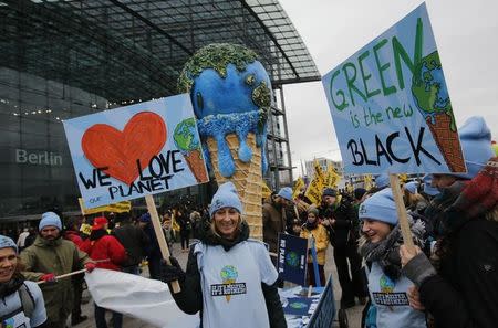 Protesters demonstrate during a rally ahead of the 2015 Paris Climate Conference, known as the COP21 summit, in Berlin, Germany November 29, 2015. REUTERS/Fabrizio Bensch