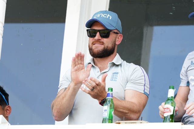 England coach Brendon McCullum celebrates