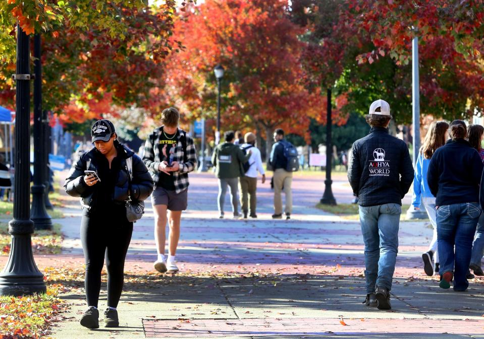 Jahzmine Gayle, left, an animal science major, walks across Middle Tennessee State University’s campus on Friday afternoon Nov. 10, 2023, in Murfreesboro, Tenn.