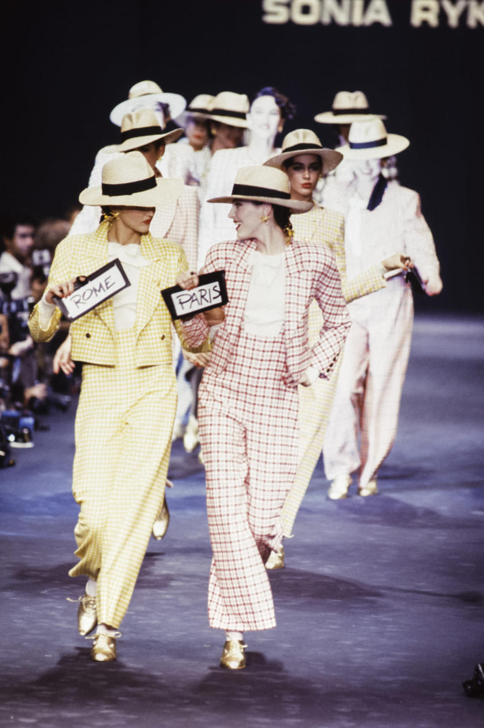 Models wear yellow and pink plaid suits at Sonia Rykiel’s spring 1988 show in Paris.