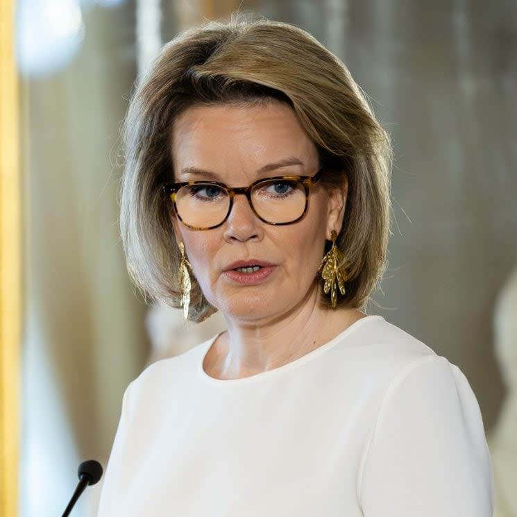 Queen Mathilde of Belgium, as a fan of contemporary jewellery, here sporting brass Jordan style earrings from French high-street brand Sezane